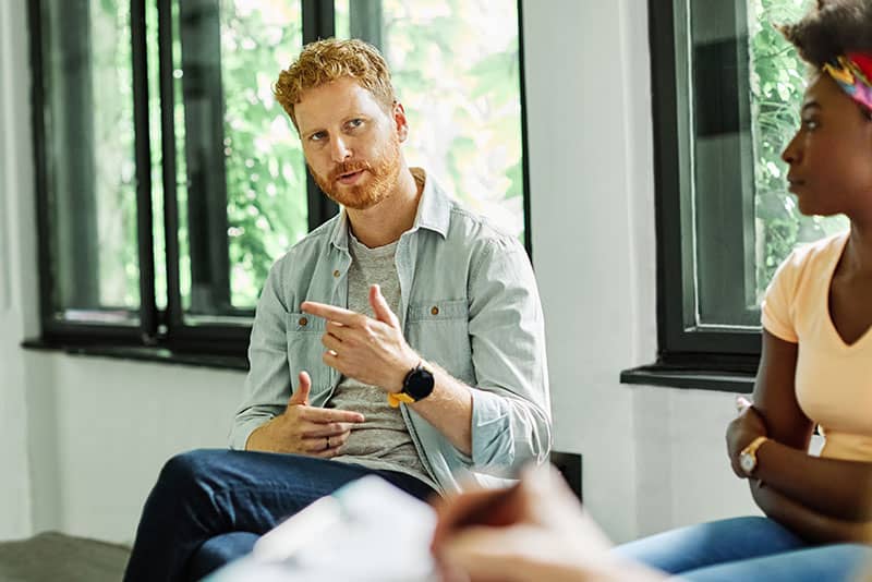 Person in group therapy as part of bipolar disorder therapy at at Virtue Recovery Center