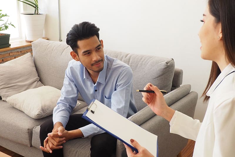 Counselor and client in cognitive behavioral therapy at Virtue Recovery Center