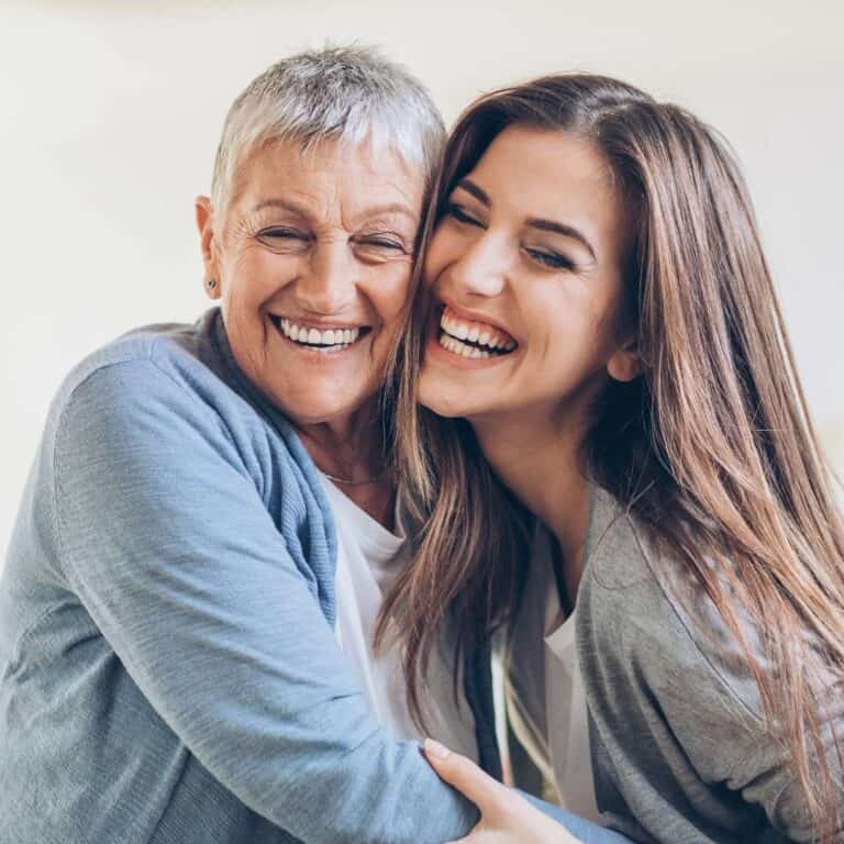 Family Style Treatment for Binge Eating Mother and Daughter Laughing and Hugging